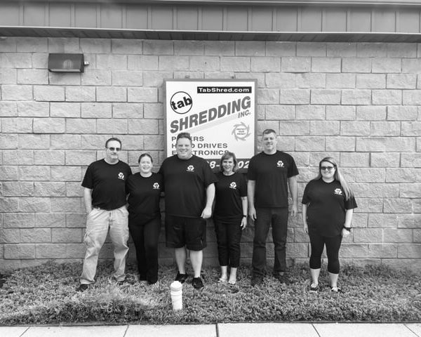 Tab Group Inc - Paper shredding team. photo